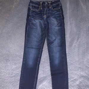 American Eagle distress high rise jegging super stretch size 2 dark blue color